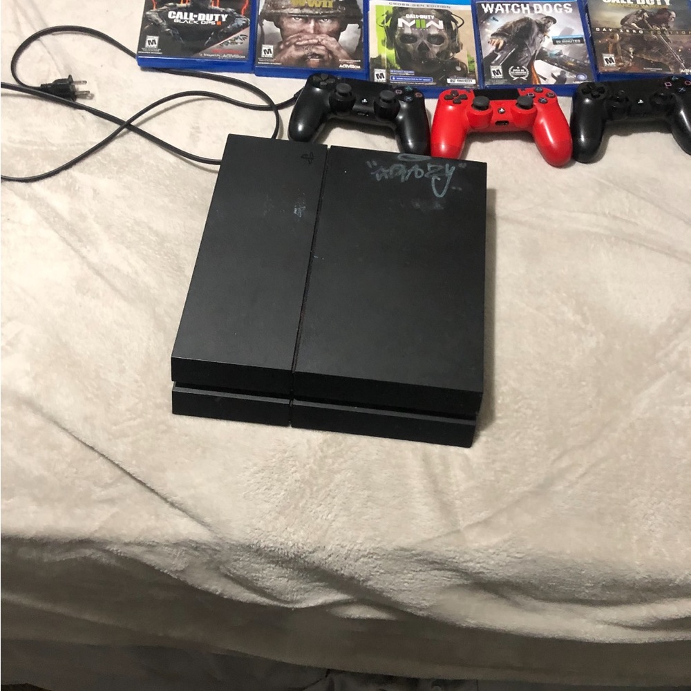 Ps4 with games and controllers and hdmi